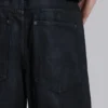 Vaqueros Colossus Jeans con cremallera y acabado recubierto