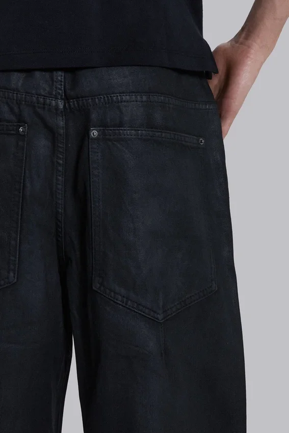 Vaqueros Colossus Jeans con cremallera y acabado recubierto