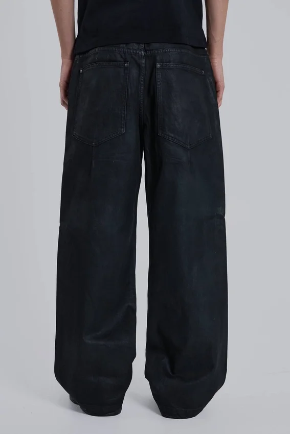 Vaqueros Colossus Jeans con cremallera y acabado recubierto