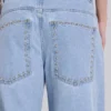 Vaqueros «Colossus Jeans» con tachuelas en lavado azul claro