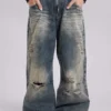 Vaqueros Colossus Jeans de talle bajo y efecto desgastado