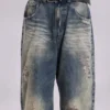 Vaqueros Colossus Jeans de talle bajo y efecto desgastado