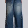 Vaqueros Colossus Jeans XL con tachuelas «Tattoo»
