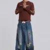 Vaqueros Colossus Jeans XL con tachuelas «Tattoo»