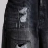 Vaqueros Colossus Jeans XL desgastados con cadenas
