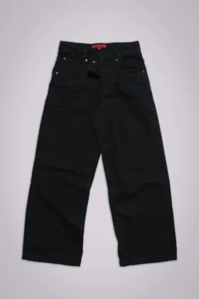 Vaqueros Colossus negros lisos de talle bajo