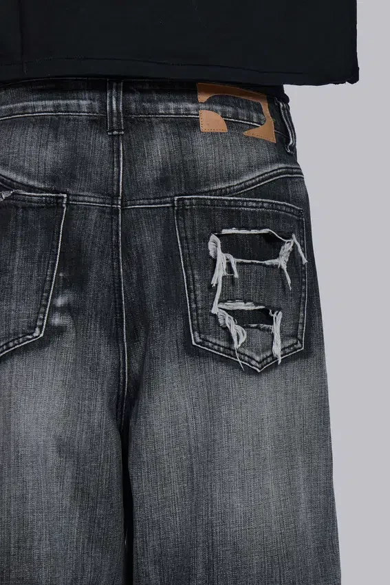 Vaqueros Colossus XL negros desgastados