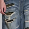 Vaqueros Colossus XL rasgados con estampado de camuflaje oculto