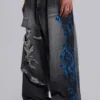 Vaqueros negros Colossus Jeans XL con rotos y diseño «Spike Airbrush»