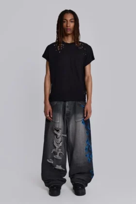 Vaqueros negros Colossus Jeans XL con rotos y diseño «Spike Airbrush»