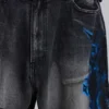 Vaqueros negros Colossus Jeans XL con rotos y diseño «Spike Airbrush»
