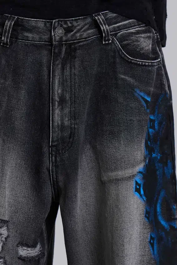 Vaqueros negros Colossus Jeans XL con rotos y diseño «Spike Airbrush»